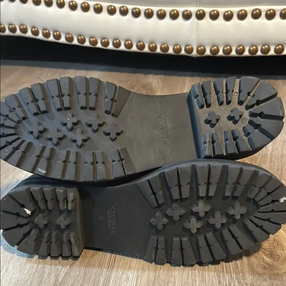 CECELIA NEW YORK Black and Gold Combat Boots with Rugged Design