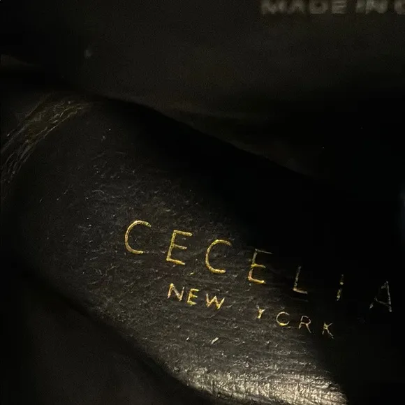 CECELIA NEW YORK Black and Gold Combat Boots with Rugged Design