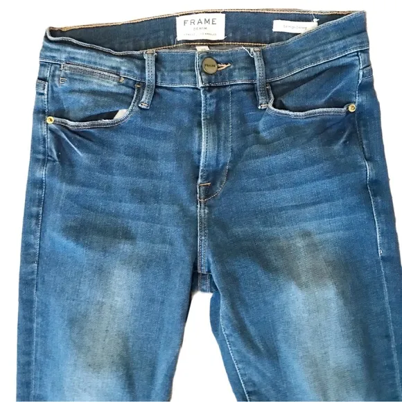 Frame Le High Skinny step hem medium wash jeans