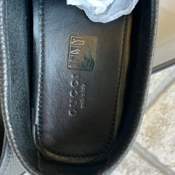 GUCCI black leather loafers.
