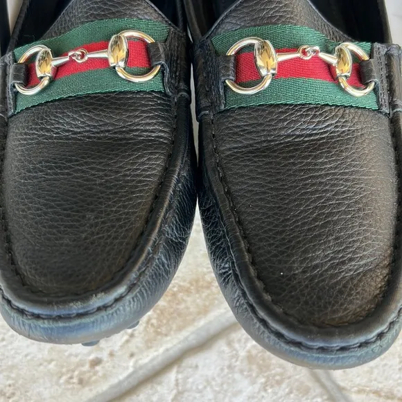 GUCCI black leather loafers.