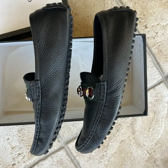 GUCCI black leather loafers.