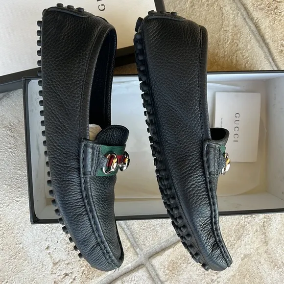 GUCCI black leather loafers.