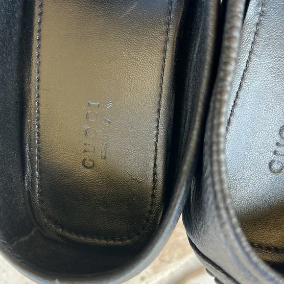 GUCCI black leather loafers.