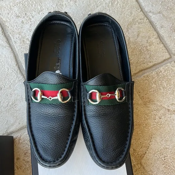 GUCCI black leather loafers.
