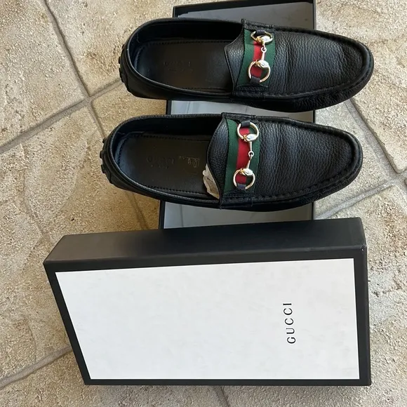 GUCCI black leather loafers.