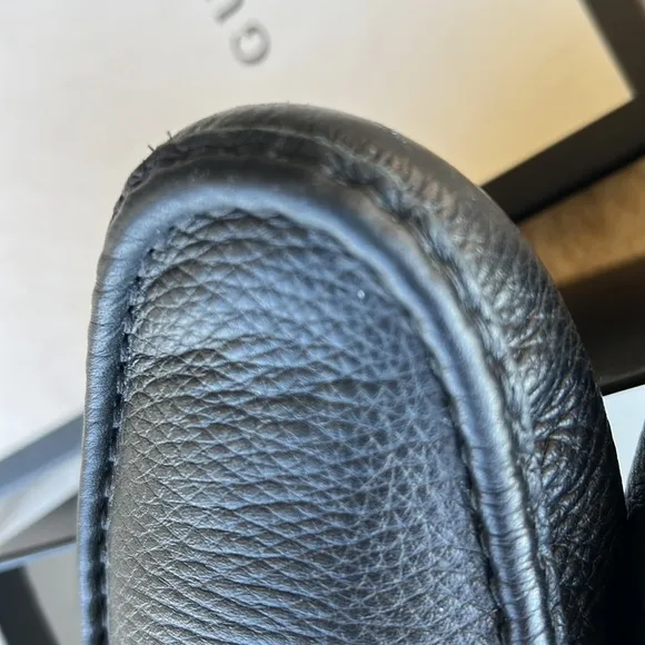 GUCCI black leather loafers.
