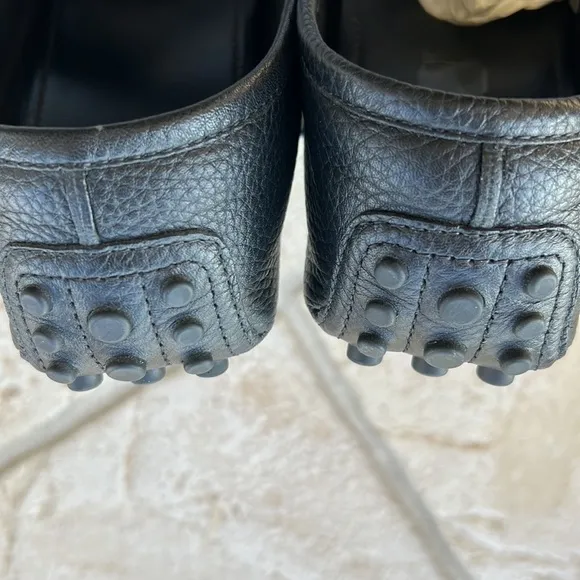 GUCCI black leather loafers.