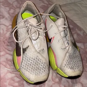 Nike White and Neon Athletic Shoes