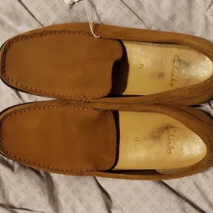 Suede loafers by Clark. Great used condition.