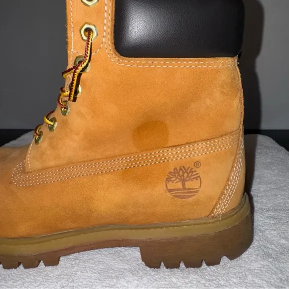 Timberland Tan and Black Boots High-Top Durable Design