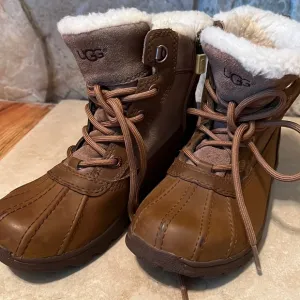 UGG children boots - size 2. Lace up color tan.