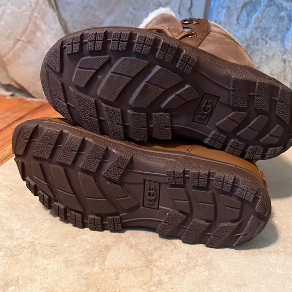 UGG children boots - size 2. Lace up color tan.