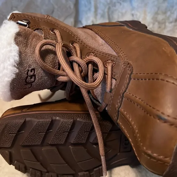 UGG children boots - size 2. Lace up color tan.